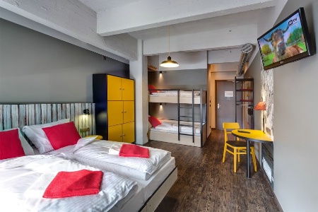 Une chambre quatre lits au Brussels City Center.